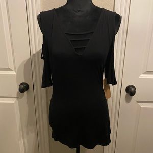 Women’s top with fun details!